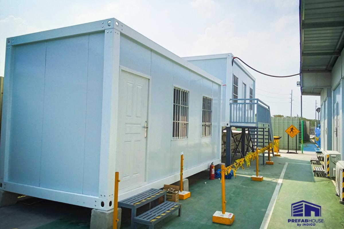 Prefab container housing units installed for temporary shelter use